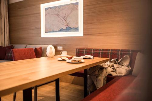 Un lugar para sentarse en Slow Living Suite - Ferienwohnung mit privater Sauna & Garten