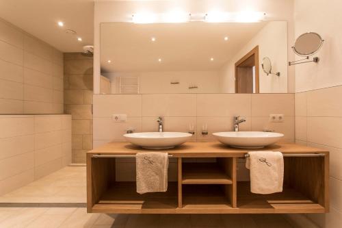 Un baño de Slow Living Suite - Ferienwohnung mit privater Sauna & Garten