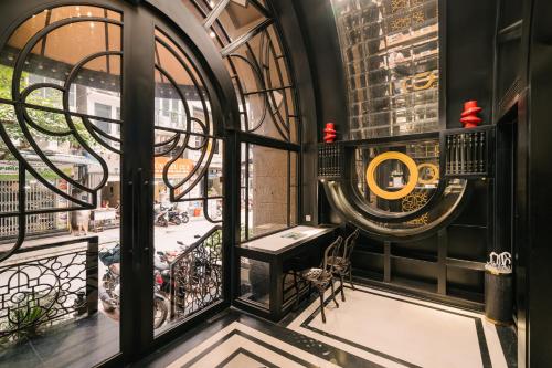 a balcony with a view of a city at Bay Luxury Fortune Grand Hotel in Hanoi