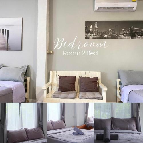 a room with two beds and a sign that says bedroom room bed at ชรัส รีสอร์ท เกาะล้าน in Ko Larn