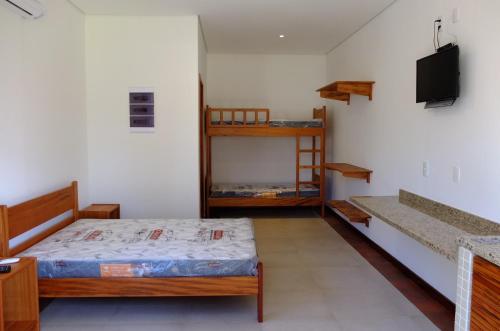 Ένα ή περισσότερα κρεβάτια σε δωμάτιο στο Suites Grande Tenorio