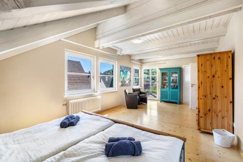 a bedroom with a large bed in a room at Villa Encanto in Albstadt