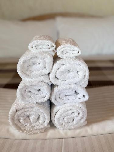 a pile of towels stacked on top of each other at Otel delfin in Karolino-Buhaz