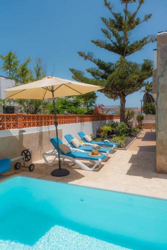 Beach house with the heated pool next to Rocky Point