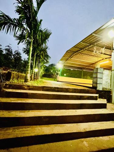 a set of stairs in front of a building at Vaidic Yoga Retreat in Ponsuli