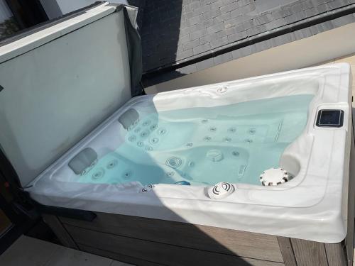 a bath tub with an animal inside of it at Ti Toenn et spa in Landéda