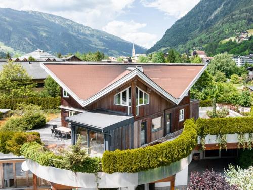 an aerial view of a house with a roof at Chalet Sendlhofer in Bad Hofgastein