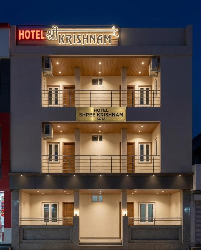 a building with a hotel registration sign on it at Hotel Shree Krishnam, Kota in Kota