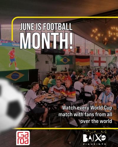 a poster for a football event with people sitting at tables at Garoa Hostel Party Bar in São Paulo