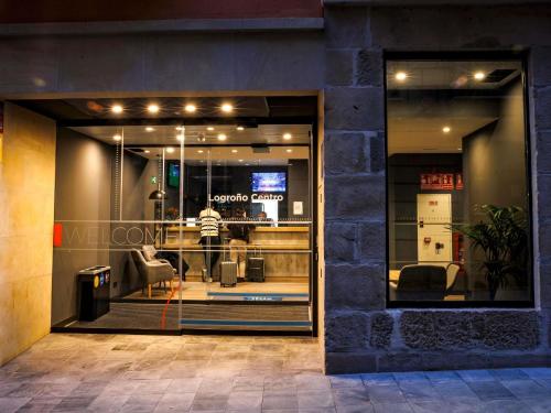 a store front window of a furniture store at ibis budget Logroño Centro in Logroño