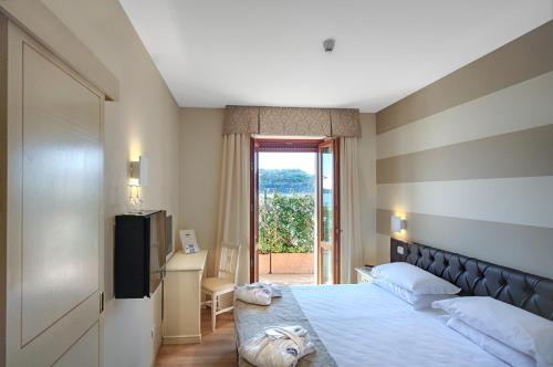
Cama o camas de una habitación en Hotel Duomo
