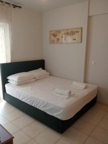 a bedroom with a bed in a room at Central 26 apartment in Kalamata in Kalamata