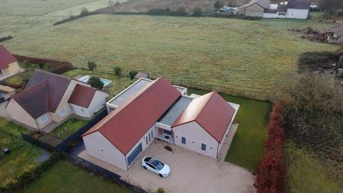 an overhead view of a house with red roofs at Villa à Lux in Lux