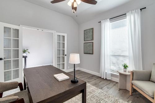 a living room with a table and a couch at Hazy Hollow Escape 4816 in Crowley