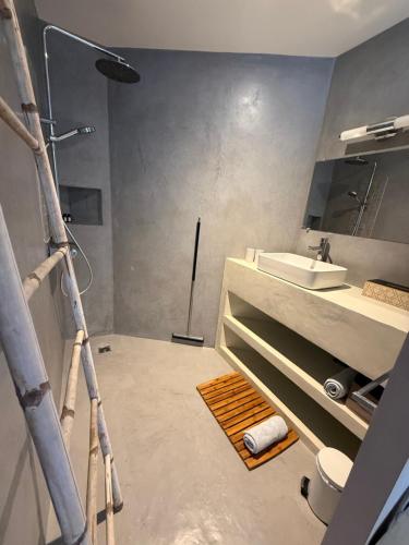 a bathroom with a shower and a sink at Casa Costa in Barbaggio