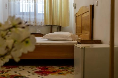 Un pat sau paturi într-o cameră la Hotel Funnytime