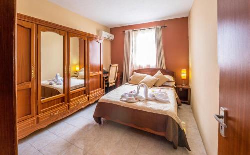Postel nebo postele na pokoji v ubytování Sunset Villa