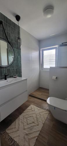 O baie la DaFi Apartament