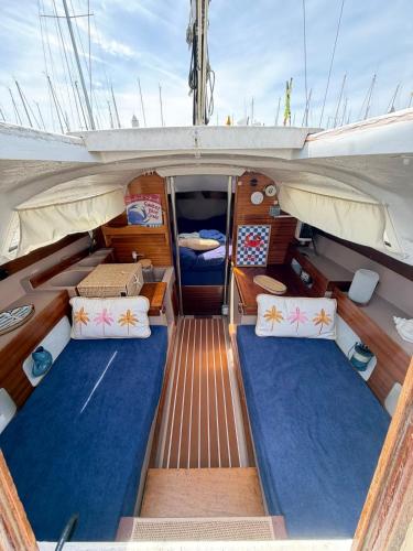 a view of the back of a boat with two beds at Nuit insolite voilier in Le Havre