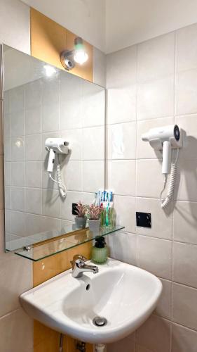 a bathroom with a sink and a mirror at Premium Villa Tode in Bansko