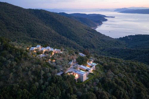 an aerial view of a house on a hill at Atrium Villas in Kechria
