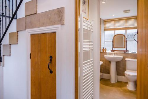 a bathroom with a toilet and a sink at 2 Bed in Hexham oc-88032 in Bardon Mill