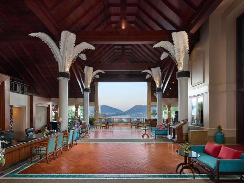 a large lobby with a view of the mountains at Novotel Phuket Resort in Patong Beach
