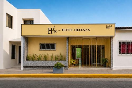 a building with a sign that reads hilt hotel heinemann at Ayenda Hotel Helenas in Ríohacha