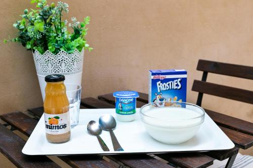 a tray with food ingredients on a table at Hotel Condal in Barcelona