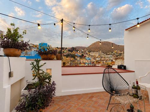 a balcony with a view of a city at Casas Balcón Gto in Guanajuato