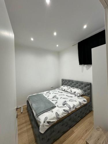 a bedroom with a bed in a room at MiR in Stolac