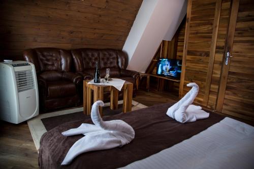 Giường trong phòng chung tại Motel Babino Brdo