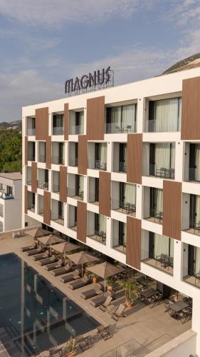 an aerial view of a building with a hotel at Magnus Hotel & SPA in Vlorë