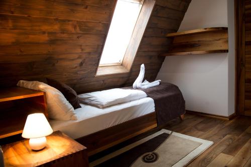 Ένα ή περισσότερα κρεβάτια σε δωμάτιο στο Hotel Babino Brdo