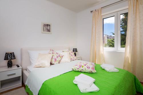 Postel nebo postele na pokoji v ubytování APARTMENT "Patricia"