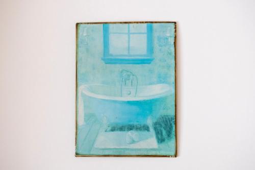 a painting of a bathroom sink with a window at The Station in Hunterville