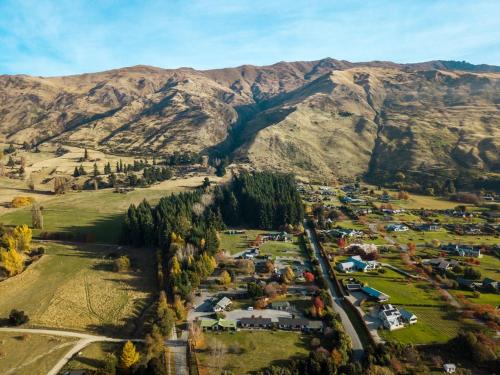 an aerial view of a village in the mountains at Tasman Holiday Parks - Wanaka in Wanaka