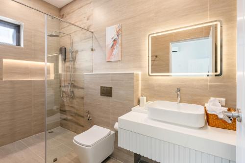 a bathroom with a toilet and a sink and a shower at Harmony Pool Villa Ao Nang in Ao Nang 