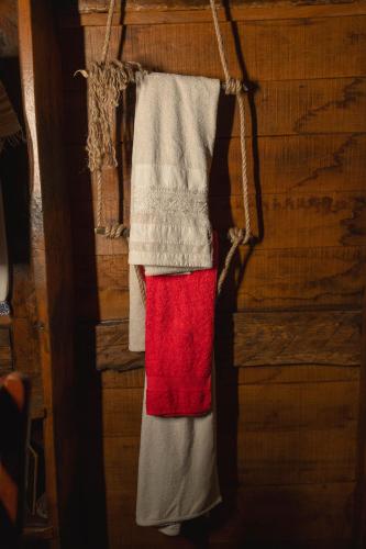a towel is hanging on a wall at Brvnara Jez in Kraljevo