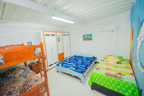 Postel nebo postele na pokoji v ubytování Apartamentos Turísticos El Conquistador