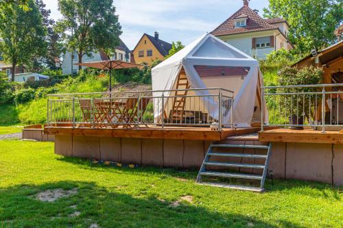 a large gazebo on top of a house at Camping Neckargemünd bei Heidelberg in Neckargemünd