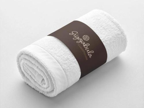 a roll of white toilet paper on a white background at Siyajabula Guesthouse in Howick