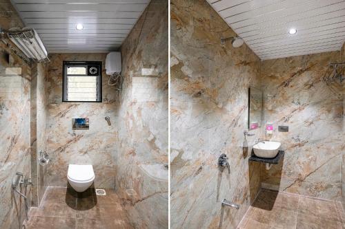 a bathroom with a shower and a toilet and a sink at FabHotel Status Residency in Mumbai