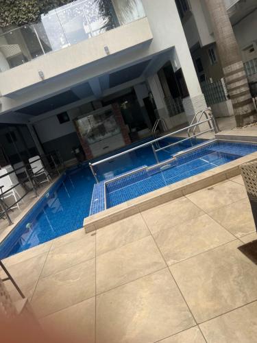 an overhead view of a swimming pool in a building at EL and LOUNGE in Accra