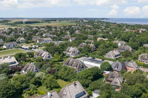 an aerial view of a residential neighborhood with houses at Henning in Keitum