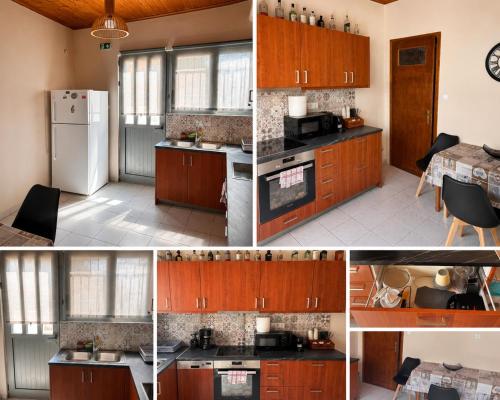 a kitchen with wooden cabinets and a white refrigerator at Panorama in Porto Rafti