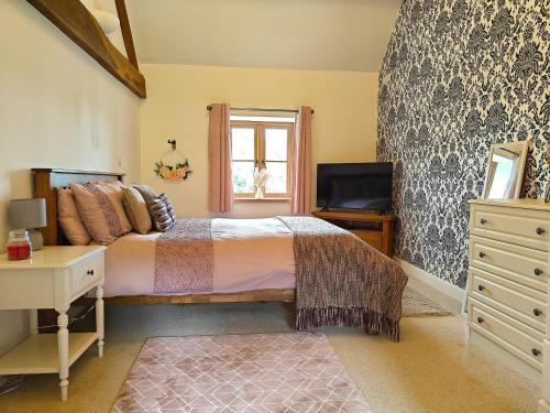 a bedroom with a bed and a window at 5 Bed in Garth oc-c44957 in Garth