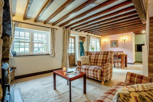 a living room with a couch and a table at 2 Bed in Leyburn oc-n41362 in Leyburn