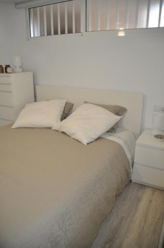 En eller flere senge i et værelse på El Rinconcito De La Almadraba