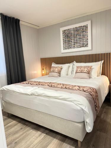a bedroom with a large bed in a room at Villa Myklebust in Olden